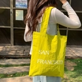 Vibrant yellow nylon tote bag with San Francisco print for casual everyday styling - Fruit Green