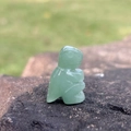 Mini 1-inch hand-carved green aventurine turtle crystal dinosaur figurine on rock - Green Aventurine