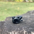 Miniature hand-carved black obsidian squirrel figurine made from natural crystal stone - Obsidian