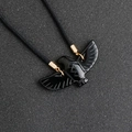 Carved black obsidian eagle pendant with gold bail and black braided rope necklace - Obsidian