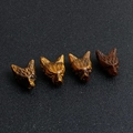Carved natural tiger eye stone and red agate wolf head figurines set of four - Tiger's Eye