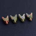 Hand-carved natural wolf head stone figurines with unique mineral patterns and textures - Unakite