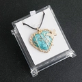 Heart-shaped turquoise pendant with golden wire wrap and butterfly charm on black cord - Blue Turquoise (Synthetic)