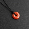 Collana con pendente donut in pietra naturale rossa e cordino intrecciato nero - Diaspro Rosso