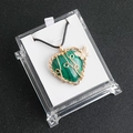 Green malachite heart necklace with wire-wrapped gold butterfly in acrylic box - Malachite (Synthetic)