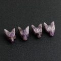 Set of four hand-carved fox heads made from natural dream amethyst with purple textures - Amethyst
