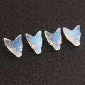 Hand-carved opalite wolf head figurines with translucent finish for home decor - Opal (Synthetic)