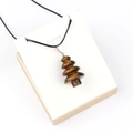 Pendentif sapin de Noël en pierre naturelle œil de tigre avec cordon noir sur carte - Œil de tigre