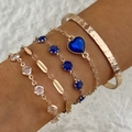 Detail shot of a layered golden bracelet set with blue heart crystals and textured cuff - Blue Heart Imitation Gemstone Five-Piece Gold Bracelet Set (23609-bra-blue)