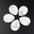 Polished white howlite stone guasha tool teardrop shape with natural grey marble veins - Howlite