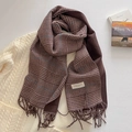 Close-up of retro plaid scarf with long tassels and elegant classic woven label - Dark Brown