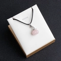 Pink quartz pumpkin pendant with silver witch hat on black cord and golden jewelry box - Rose Quartz
