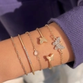 Detail view of 5-piece gold bracelet set with butterfly pendants and faux diamonds - Full Rhinestone Butterfly Five Piece Gold Jewelry Set (23573-1)