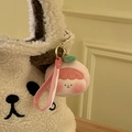Süßer rosa Pfirsich-Plüsch-Schlüsselanhänger mit Silikonband an weißer Plüschtasche - Pfirsich-Knautschspielzeug-Anhänger
