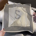 Detailed view of polka dot square scarf with letter S design on plush background - FW-169-White