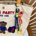 Blau-weiß karierter geflochtener Schlüsselanhänger mit orangefarbener Kette und Smiley - Dunkelblaues Smiley-Schlüsselband