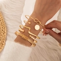 Detail of six-piece luxury gold plated bracelet set styled on model with diverse patterns - Knot and Round Piece Decoration 6-Piece Set (25779-1-G) / Gold