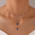 Collar de tres capas dorado con gemas azules rectangulares y redondas y cristales brillantes - Oro con gema azul (23931-golden)