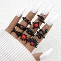 Set di 10 anelli gotici in metallo nero con pietre rosse, serpenti e motivi solari - Set da 10 Pezzi Serpente Sole Luna (25501-black)