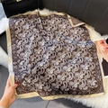 Detail of paisley print silk scarf with champagne gold satin edges on plush background - 70x70cm / Dark Brown (W-435)