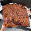 Detail of orange paisley silk square scarf with brown border and smooth satin texture - 70x70cm / Orange Red (W-435)