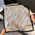 Detailed view of the paisley silk scarf featuring vintage black patterns on ivory fabric - 70x70cm / Black Edge (W-435)