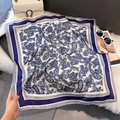 Detailed macro view of retro paisley print silk scarf on a soft luxury textured background - 70x70cm / Blue (W-442)