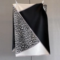 Detail of cashmere-like scarf showing geometric color blocks and leopard print with fringe - Black (GSJ-604-Black)