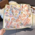 Detail of silk-feel scarf featuring orange tulip floral prints on a soft cream base - 70cmx70cm / Light Green (W-417)
