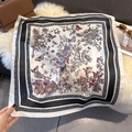 Detail of silk-like square scarf featuring elegant floral patterns and butterfly prints - 70cmx70cm / White Black (W-425)