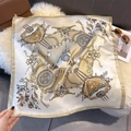 Close-up of elegant faux silk scarf with vintage carriage prints on a white plush rug - 70cmx70cm / Champagne (W-432)