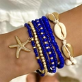 Set de 7 tobilleras bohemias con cuentas azules, dijes de estrella de mar y conchas naturales - Azul marino