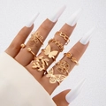 9-piece gold ring set featuring butterflies, flowers, and geometric designs on fingers - Butterfly Floral Gold Style (25231-gold)