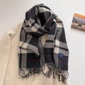 Macro detail of thick plaid scarf with soft tassels and woven label on beige coat - Black (FYR-293-Black)