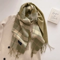 Close-up of sage green and beige plaid scarf with fringe detail and brand label - Light Green (FYR-293-Light Green)