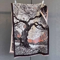 Detailed view of the thick autumn scarf featuring a scenic jacquard knit and fringe edges - Reddish Brown Artistic Landscape (GSJ-599-Red-brown)