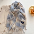 Detail of blue and beige plaid scarf with handmade tassel fringe on a beige blazer - Blue (FYR-295-Blue)