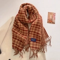 Close-up of red and yellow plaid scarf with fringe detail and Elegant & Classic blue label - Reddish Brown (FYR-292-Reddish Brown)