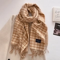 Detail of checkered scarf fringe and Elegant Classic label on soft brown wool fabric - Light Brown (FYR-292-Light Brown)