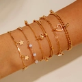Fünfteiliges goldenes Armband-Set mit Herz-, Sternanhängern und eleganten Perlen - Gold 5-Teiliges Set (25687-G)