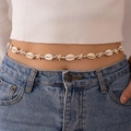 Detail of beach body chain with natural shells and starfish on a model waist - White (23898-white)