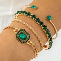 Dettaglio di un set di 4 bracciali placcati oro con cristalli verde smeraldo - Set di 4 Pezzi - Smeraldo/Zirconia Verde / Oro-Verde