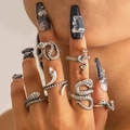 Set of vintage silver snake rings featuring punk serpentine designs on fingers - Vintage Coiled Snake Style (27060-silver)