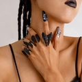 Gothic angel wing ring set in matte black finish worn by model with dark aesthetic - Black Style (26450-black)