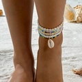 Close-up of bohemian layered anklet with colorful beads and natural shell on sand - Colorful Shell Style (27136-colour)