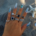 8-piece punk gothic ring set with skull hand, eye symbols and black gems on a beach background - Vintage Silver (27074-silver)