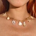 Detail of bohemian gold chain necklace with starfish and seashell pendants on skin - Gold Paperclip Chain Marine Life Pendant (29646)