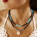 Dettaglio della collana bohémien a doppio strato con perline e ciondolo a conchiglia - Stile A Doppio Strato Con Conchiglia E Perline Nere Blu (27258-black)