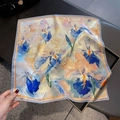 Detailed close-up of silk square scarf featuring oil painting style floral pattern - 53x53cm / Blue