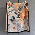 Detail eines floralen Strickschals mit orangefarbenen Blattmustern und Fransen - 190*65cm / Schwarze Kante (GSJ-519-黑色边)
